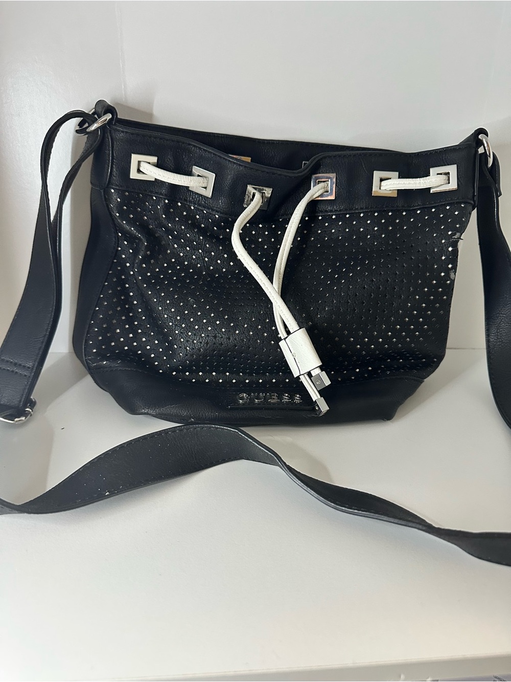 GUESS Black Crossbody Drawstring Bag with White Accents